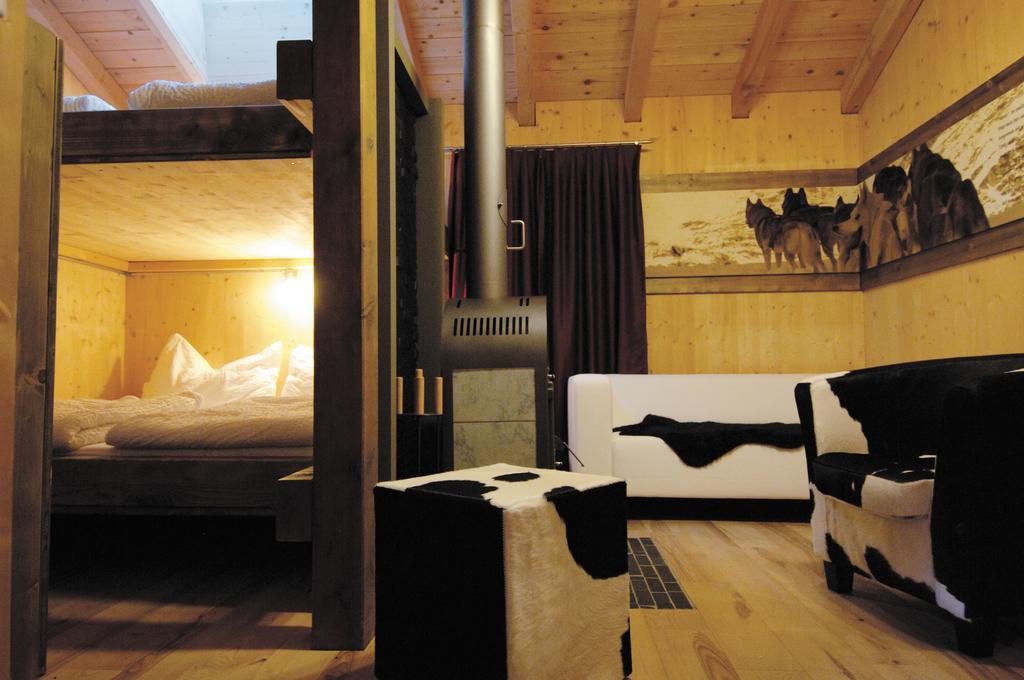 Huettenhotel Husky Lodge Муотаталь Номер фото